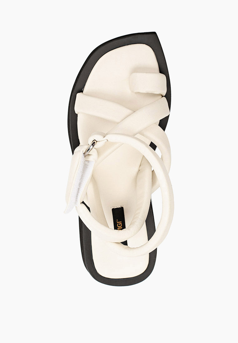 Top view of ivory leather flatform sandals with padded straps and adjustable closure
