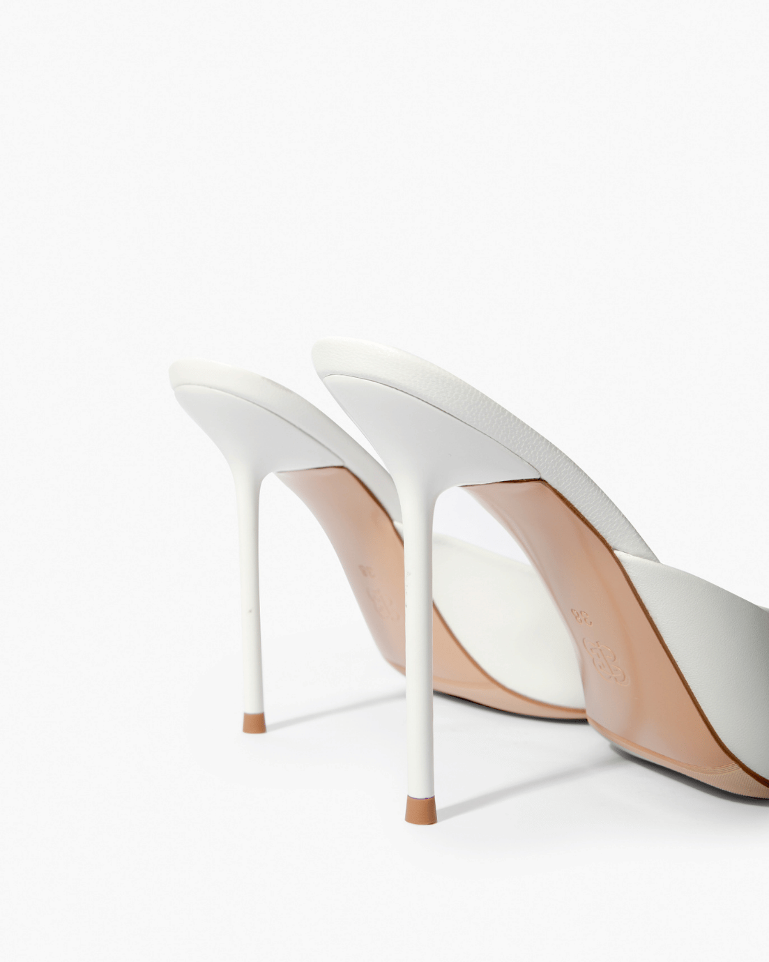 Ivory leather stiletto mules, heel and sole detail