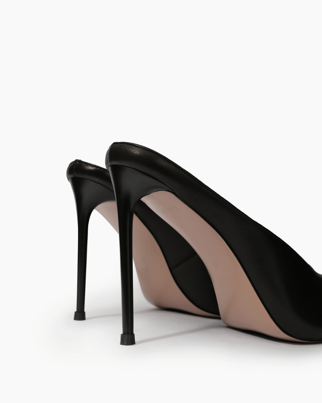 Black stiletto mule heel and sole detail