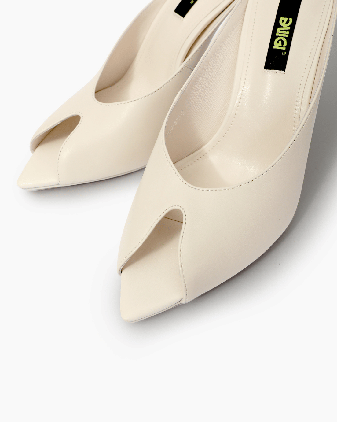 Close-up of ivory angular peep-toe leather mule