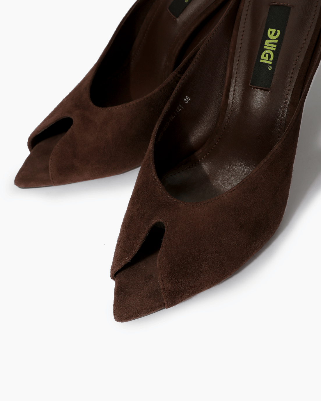 Close-up of dark chocolate elongated peep-toe mule
