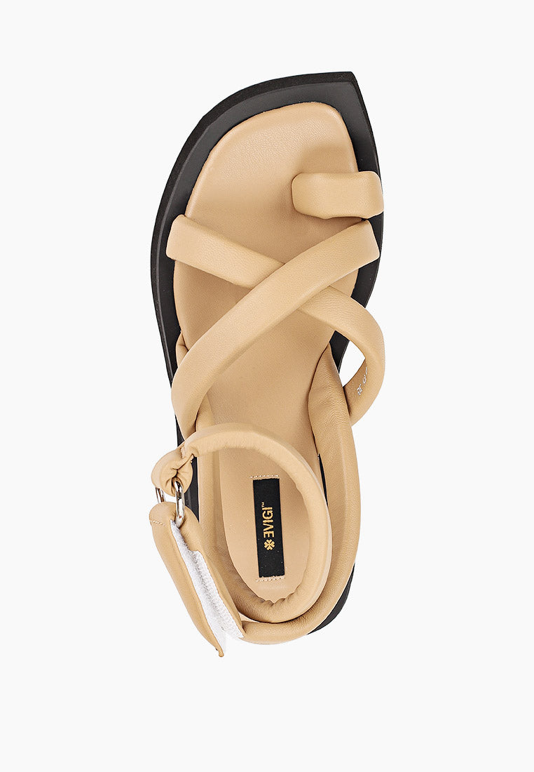 Top view of beige leather platform sandal with padded straps and adjustable ankle closure