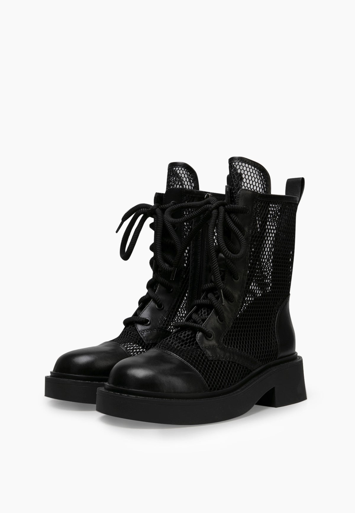 Pair of black lace-up mesh combat boots with leather toe caps and chunky soles