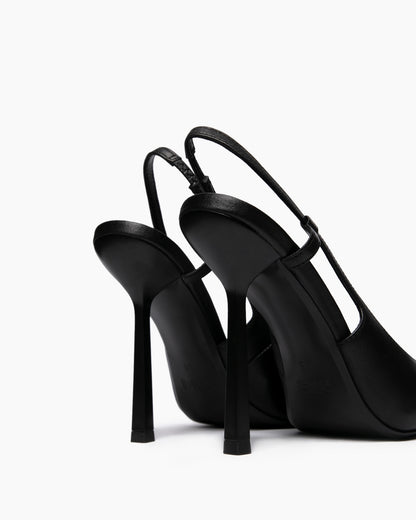 Rear view of black leather slingback heels showing slim straps and high flared stilettos