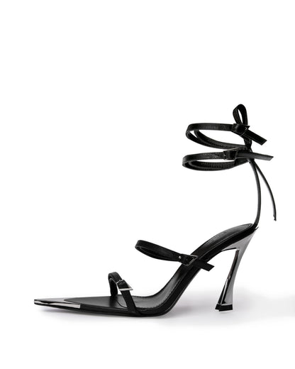 Black leather wraparound heel with mirrored pointed toe cap and sculptural high heel, side profile