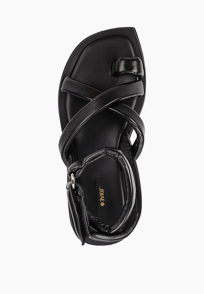 Top view of black leather platform sandal with toe loop and wrapped crossover straps