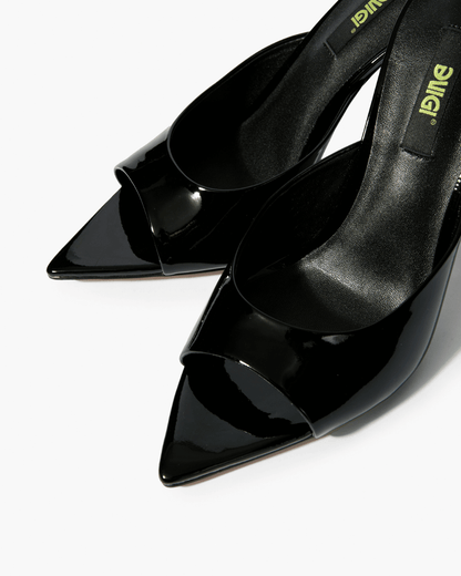 Black patent leather mules with open toe and pointed footbed detail