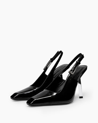 Pair of black patent leather slingback pumps with sculptural transparent heels, three-quarter view