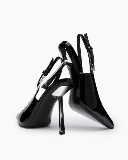 Black patent leather slingback pumps showing the curved profile and clear geometric heel detail