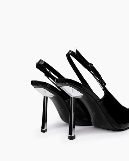 Rear view of black patent slingback heels with adjustable straps and transparent stiletto heels