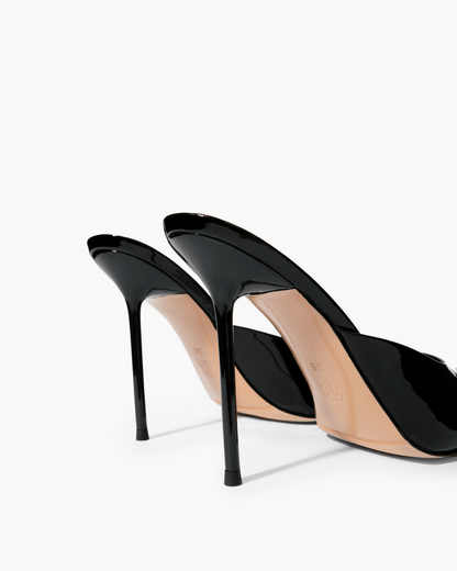 Black patent leather mules, stiletto heel and sole detail