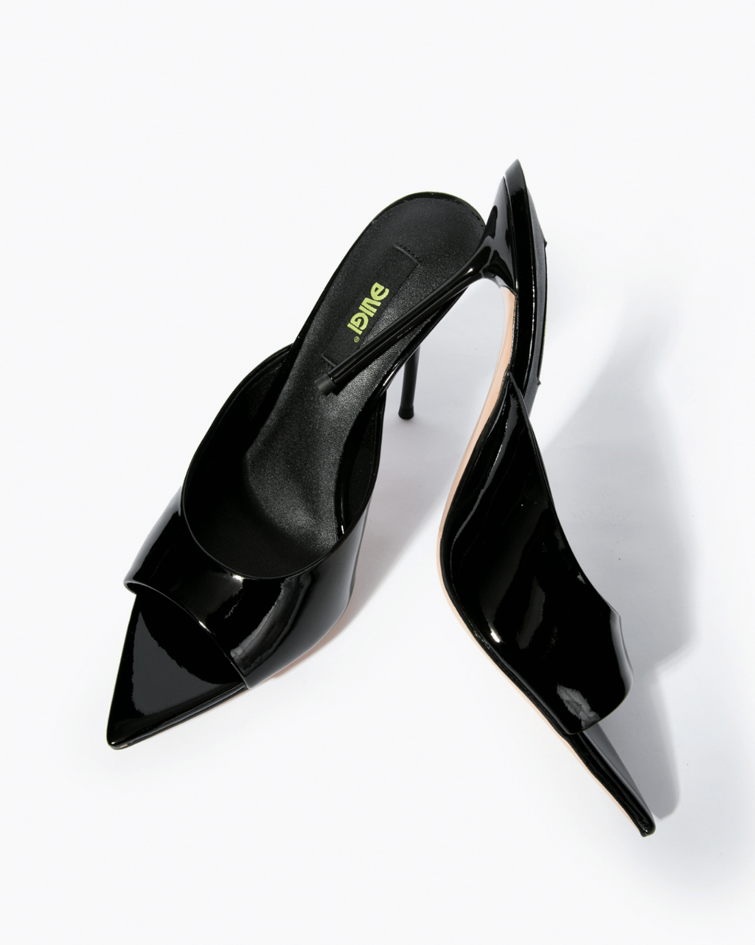 Black patent leather stiletto mules, top view