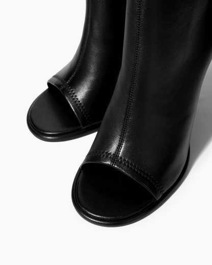 Black leather ankle boots with open toe and tonal stitching