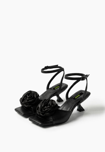 Black leather low-heel sandals with textile rosettes, pair view