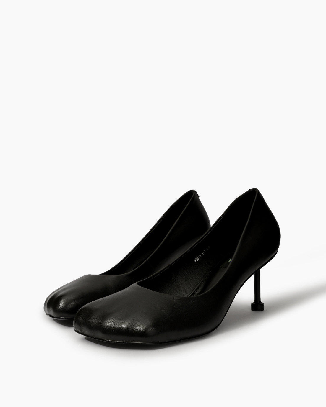 Pair of black square-toe pumps — three-quarter view