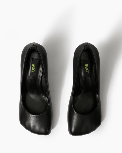 Pair of black EVIGI square-toe pumps — top view