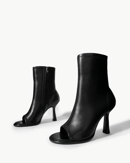 Black stretch-leather ankle boots with side zip