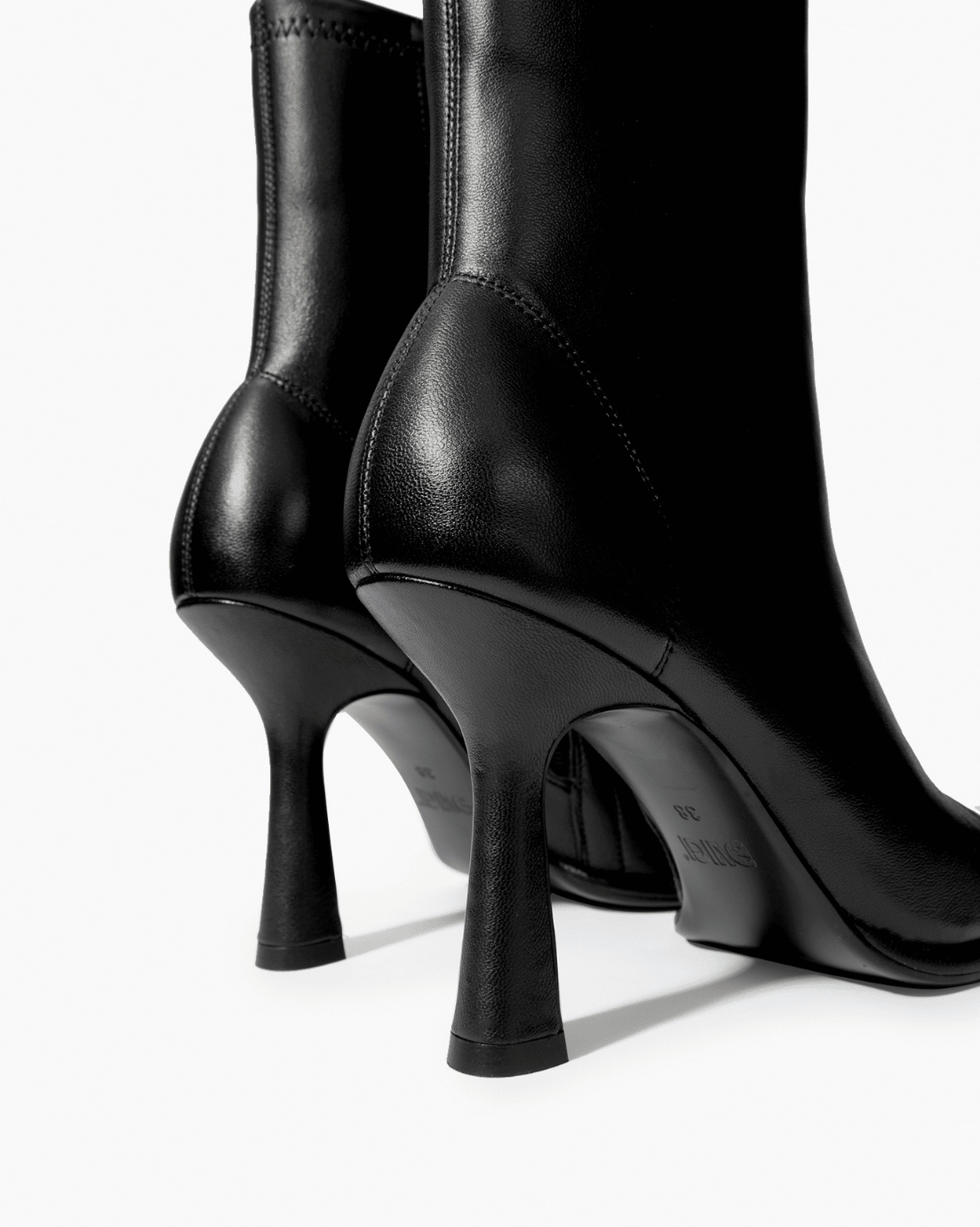 Black stretch-leather ankle boots with high flared heel