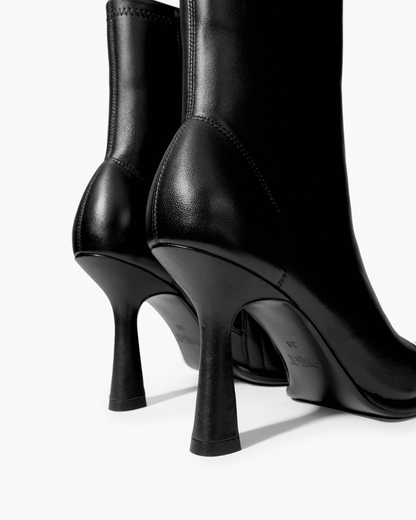 Black stretch-leather ankle boots with high flared heel