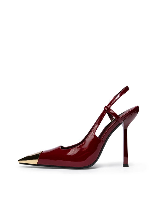 Burgundy patent leather T-strap heel with polished gold-tone metal toe cap, side profile