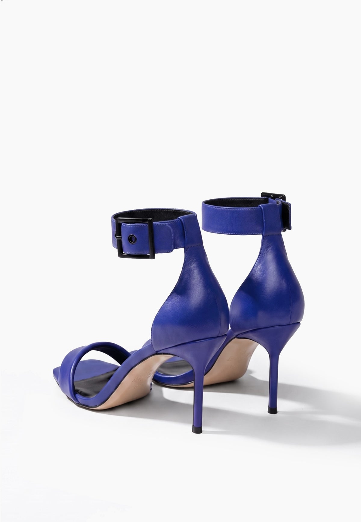 Rear view of cobalt blue genuine leather stiletto heels