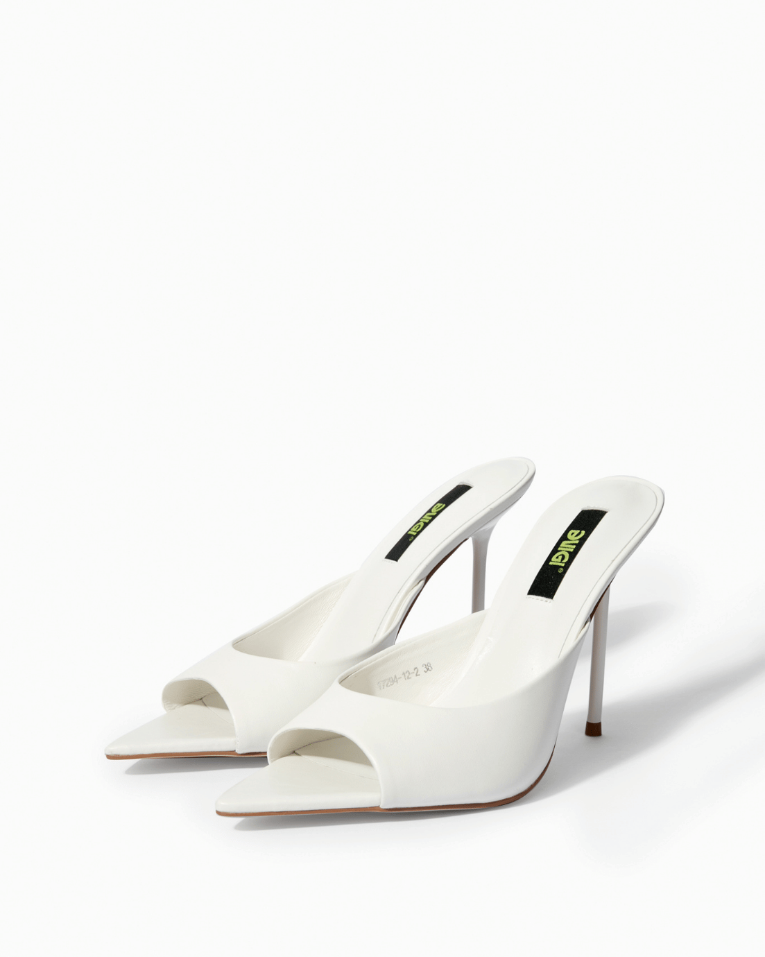 Pair of ivory genuine leather sculpted-toe mules