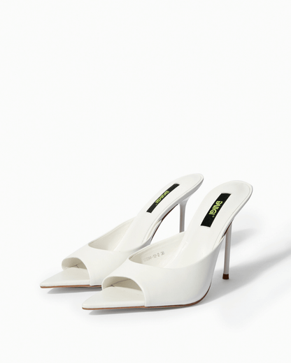Pair of ivory genuine leather sculpted-toe mules