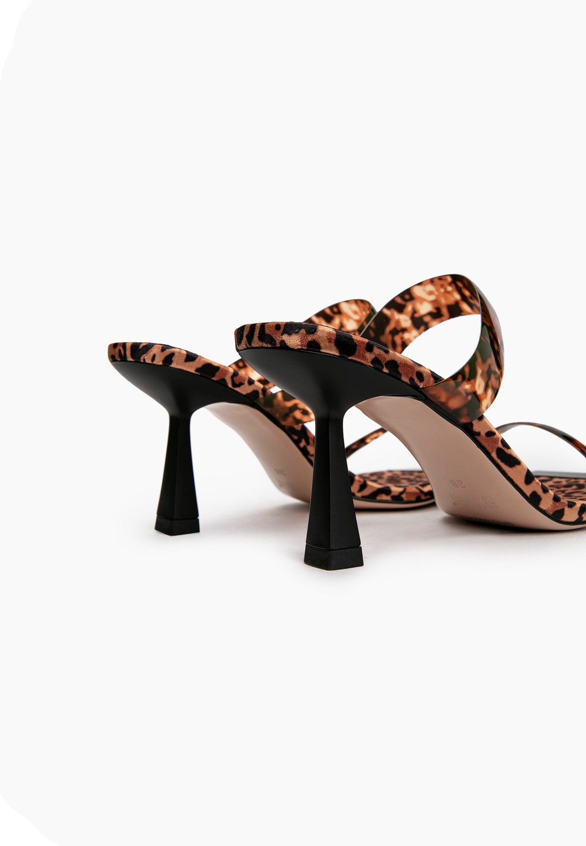 Leopard-print heels with black sculptural heel, rear view