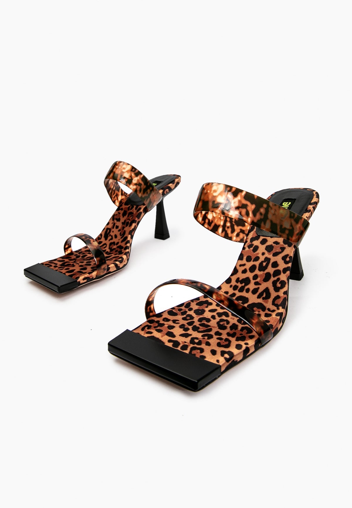 Leopard-print leather and silicone strap heels, front three-quarter view