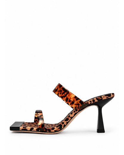 Leopard-print leather and silicone strap heels, side view