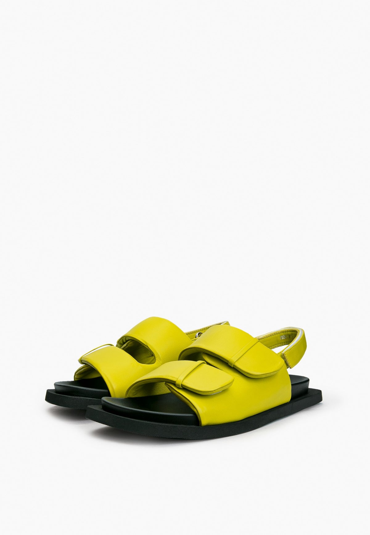 Pair of lime green leather comfort sandals with adjustable padded straps