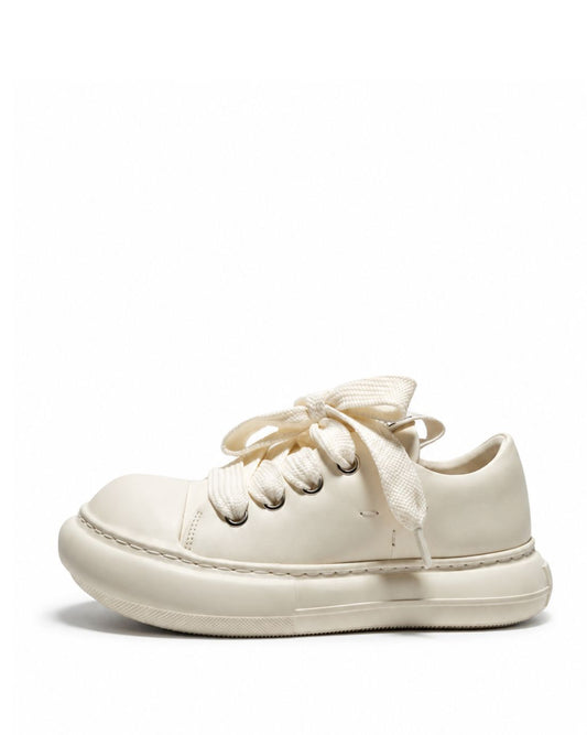 Milky ivory leather platform sneakers with oversized laces, side view
