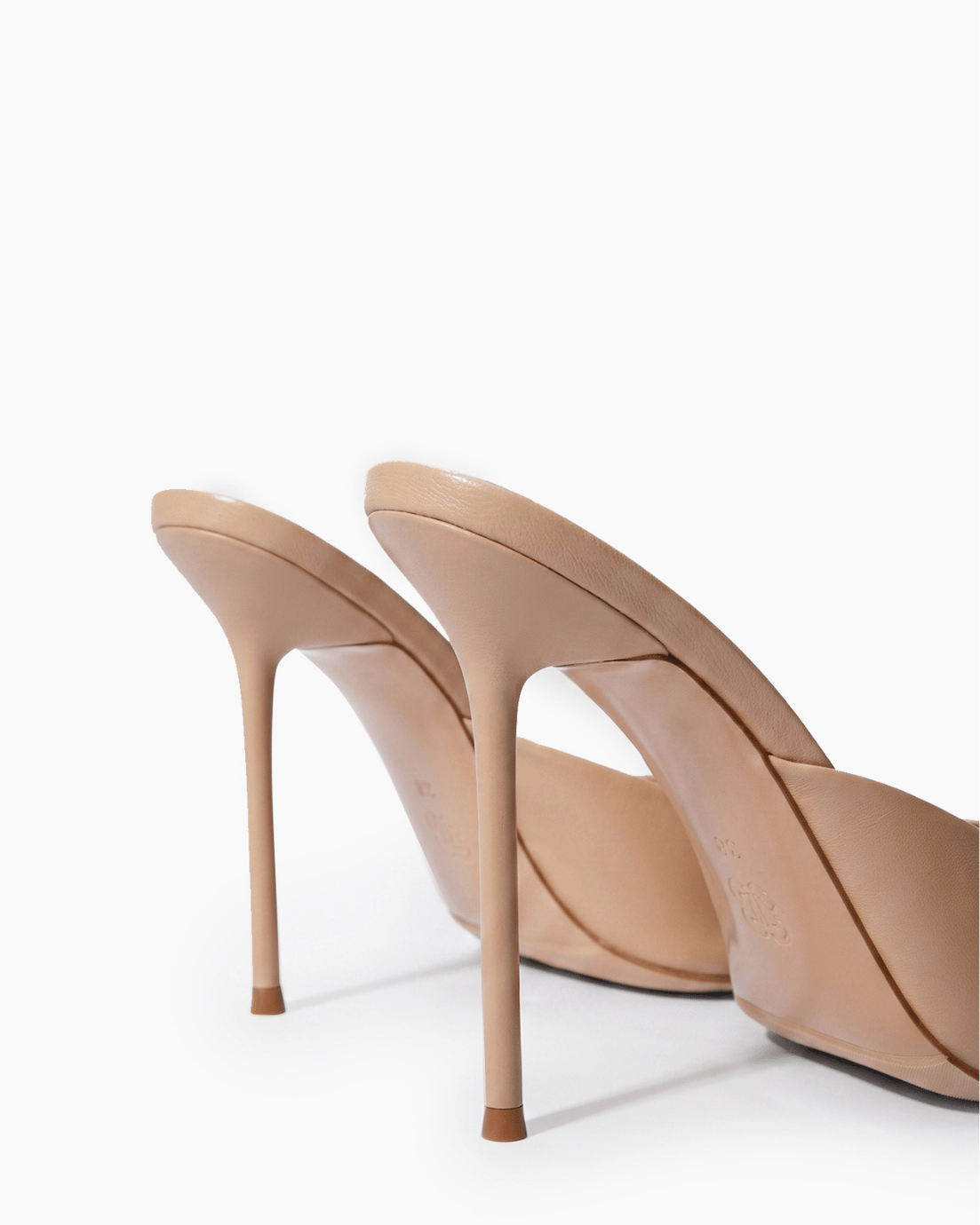 Nude beige leather stiletto mules, heel and sole detail