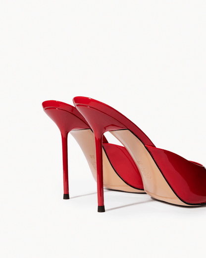 Red patent leather mules, stiletto heel and sole detail