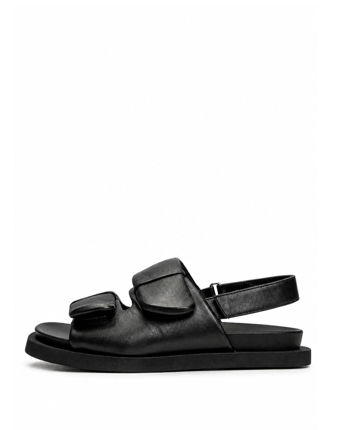 Black soft leather double-strap sandals with padded adjustable straps, side view